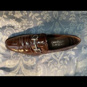 Men’s Salvatore Ferragamo brown patent leather shoes. Great statement shoe!